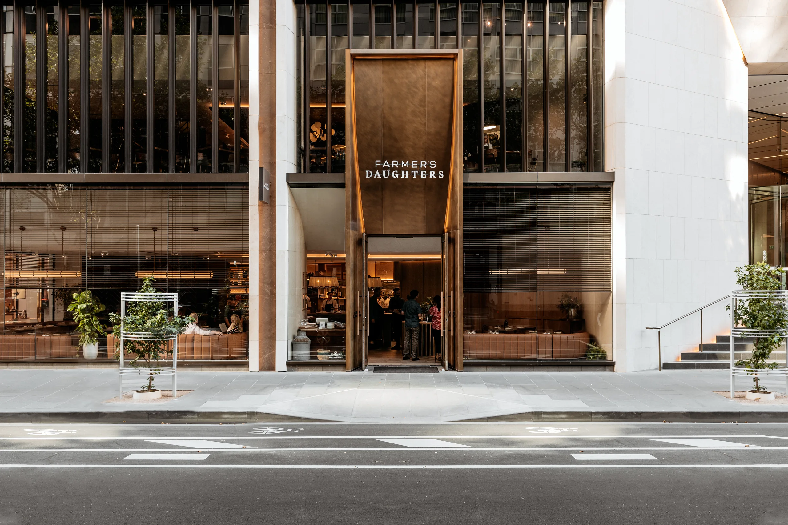 Farmers Daughters Collins Street restaurant interior and exterior showcasing multi-level dining spaces